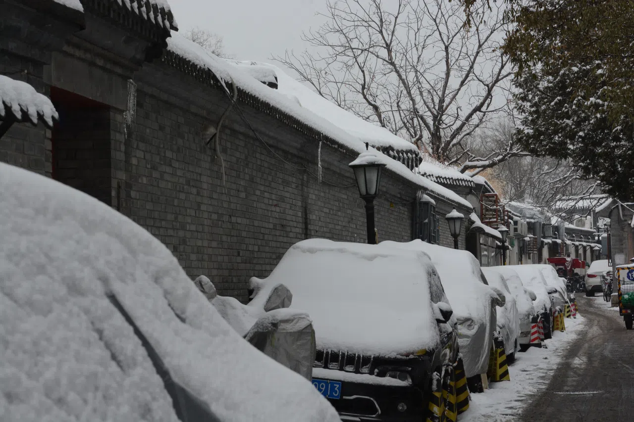 胡同的雪中即景。