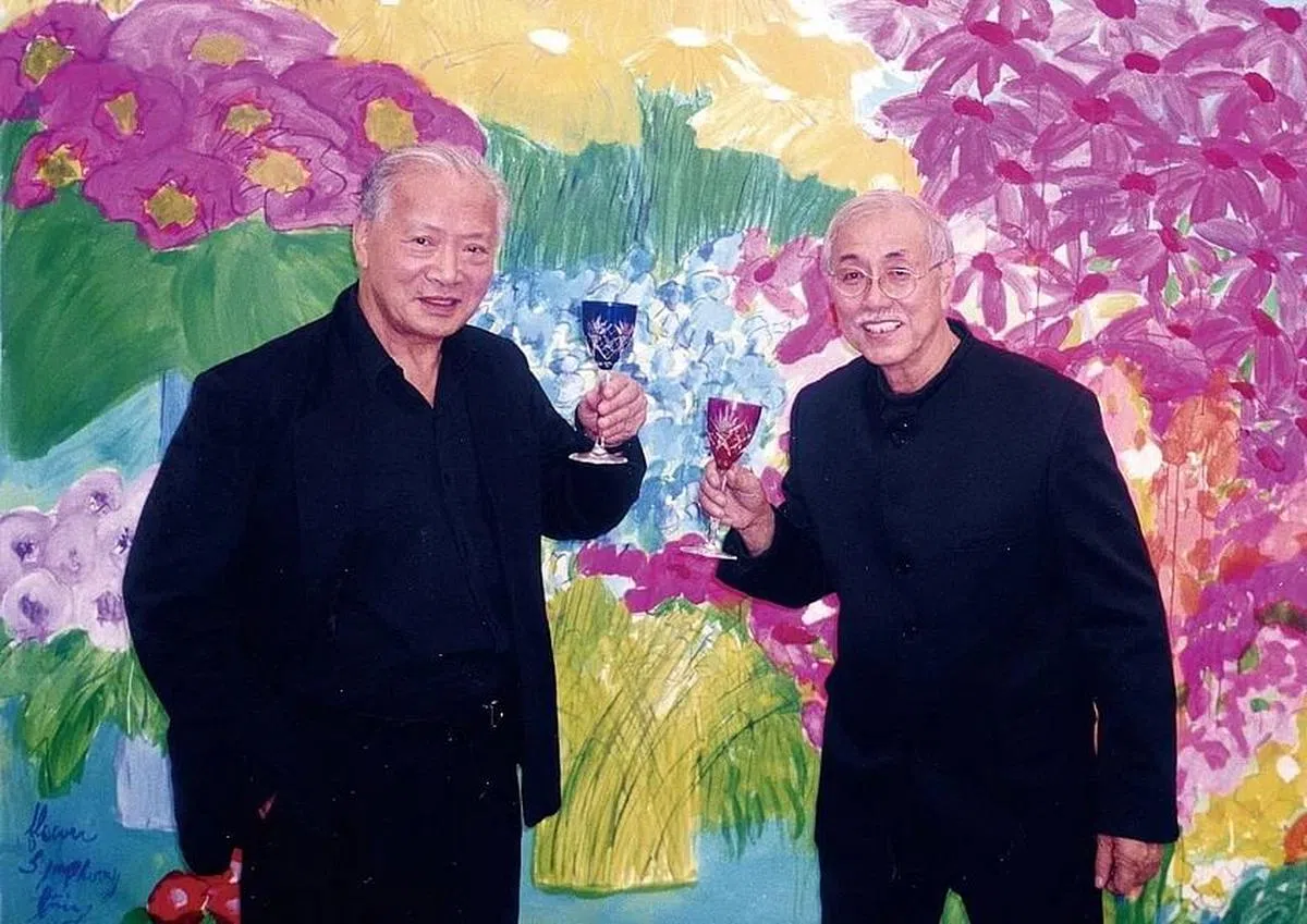 蔡斯民为丁雄泉（左）办过画展。（受访者提供图片）