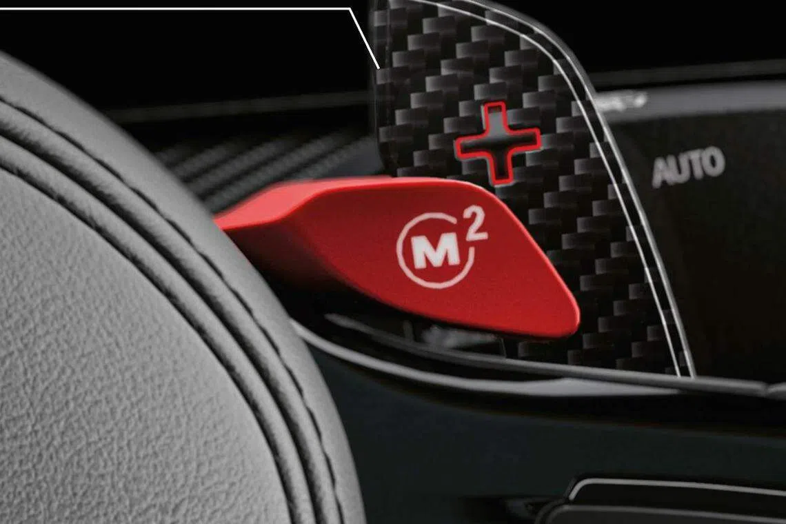 驾驶盘上有M1和M2驾驶模式按钮。（车商提供）