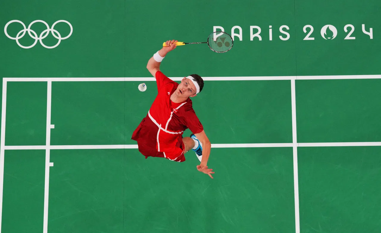 丹麦名将安赛龙以两金一铜，成为奥运史上成绩最好的羽球男单选手。（路透社）