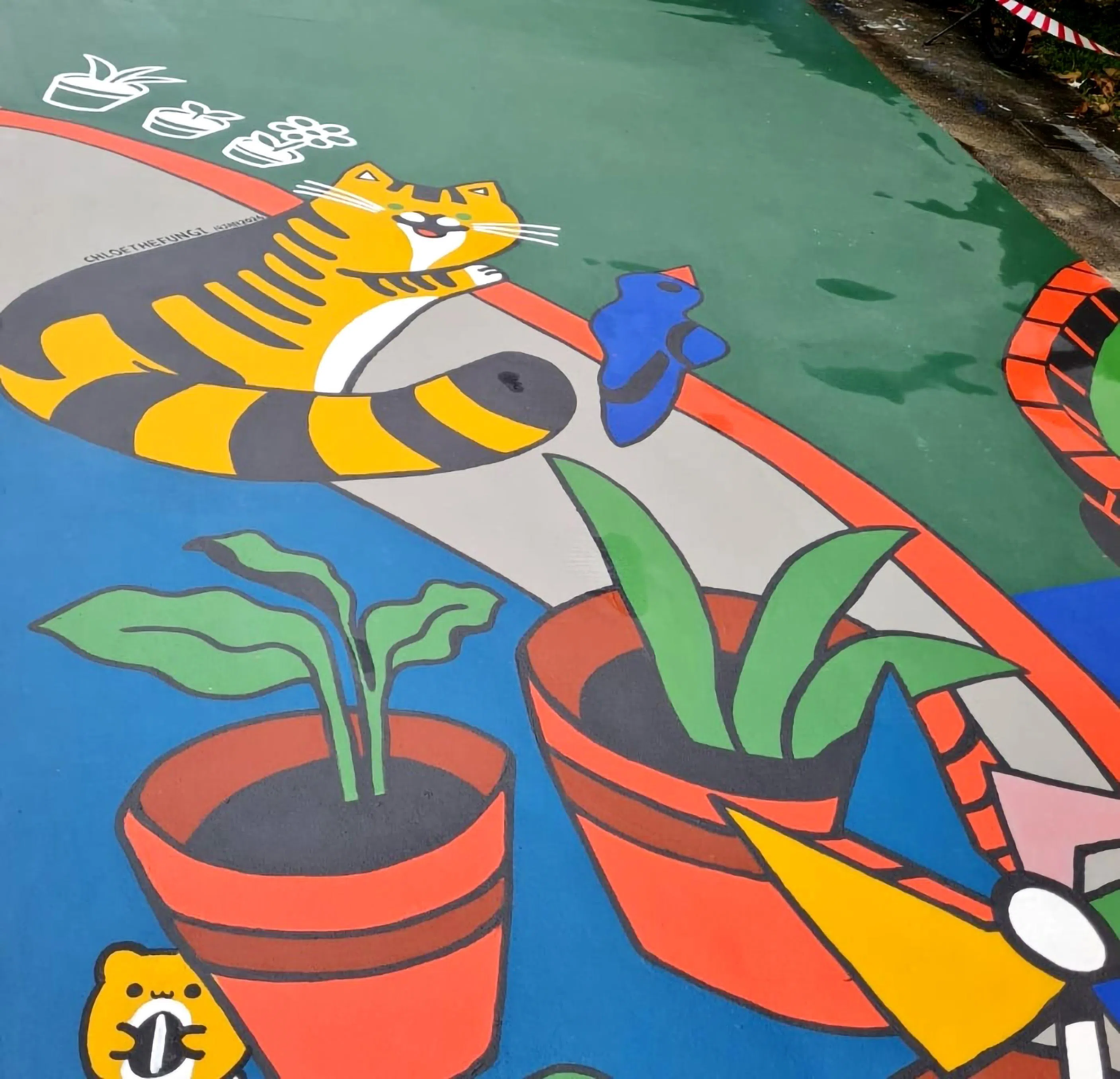 邻里皆知的社区猫“Bob”也化作脚下绚丽的街头艺术。（受访者提供）