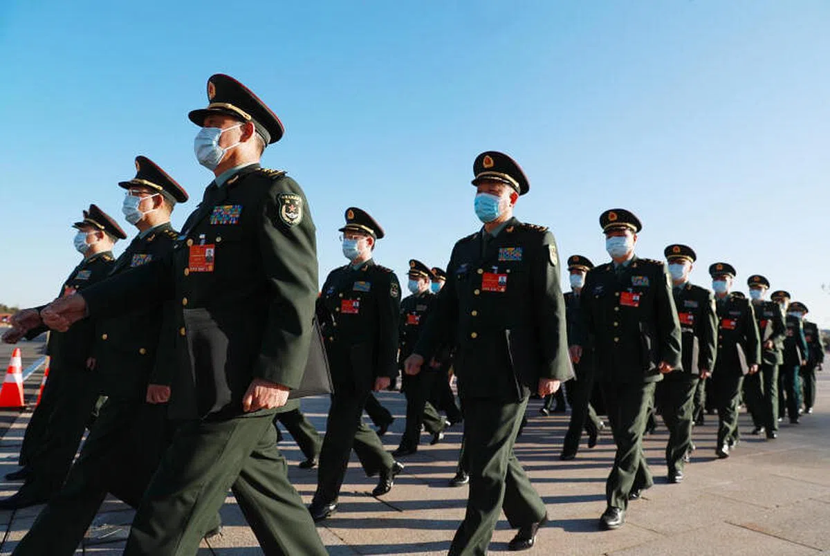 中国全国人大会议发布的预算草案报告披露，今年中国军费预算增长7.1%，比去年高0.3个百分点。（新华社）