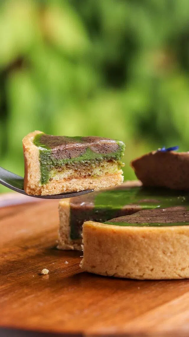 抹茶加咖啡挞散发茶香与咖啡香。（咖啡馆提供）