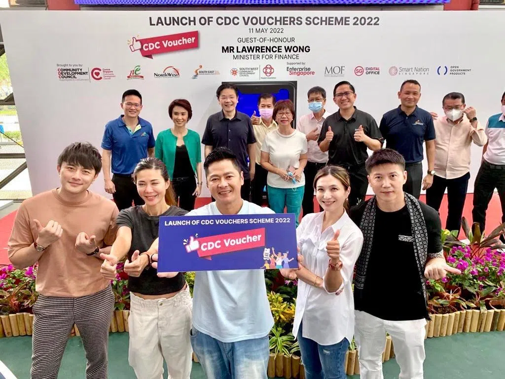 李南星等人2022年出席CDC购物券活动时的照片被移花接木。（LNX Global 提供）