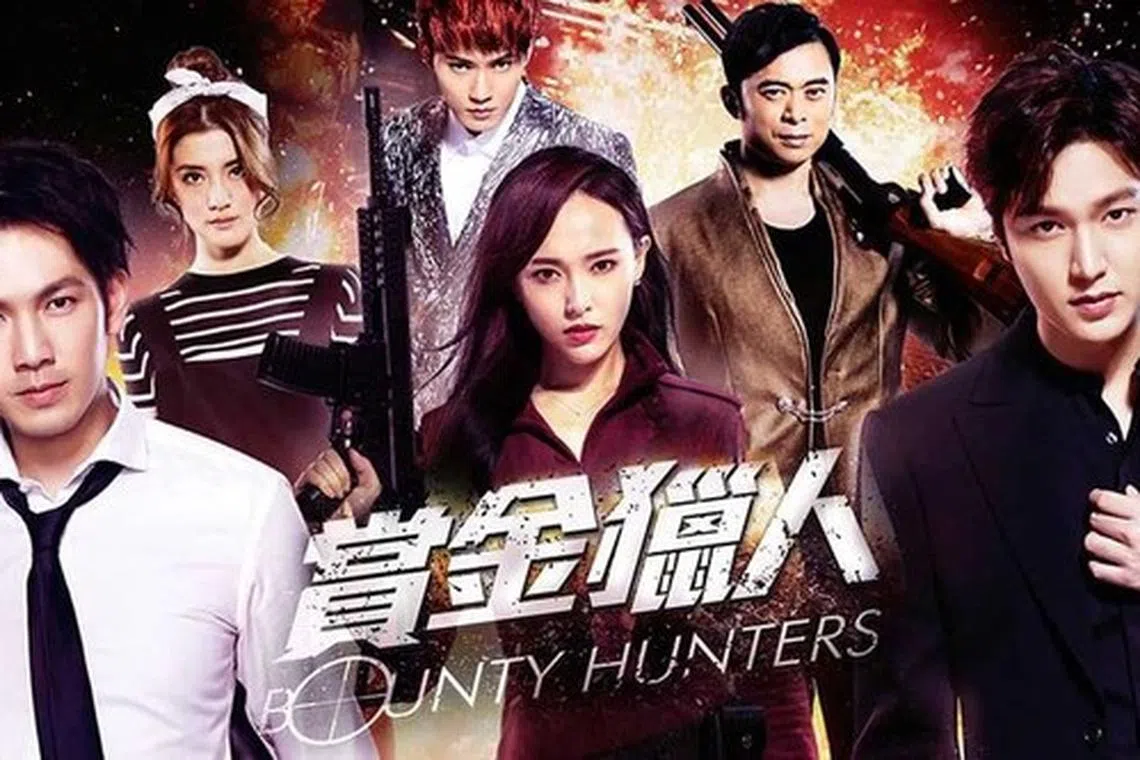 《赏金猎人》集结中港韩演员，包括锺汉良（前排左起）、唐嫣与李敏镐。（互联网）