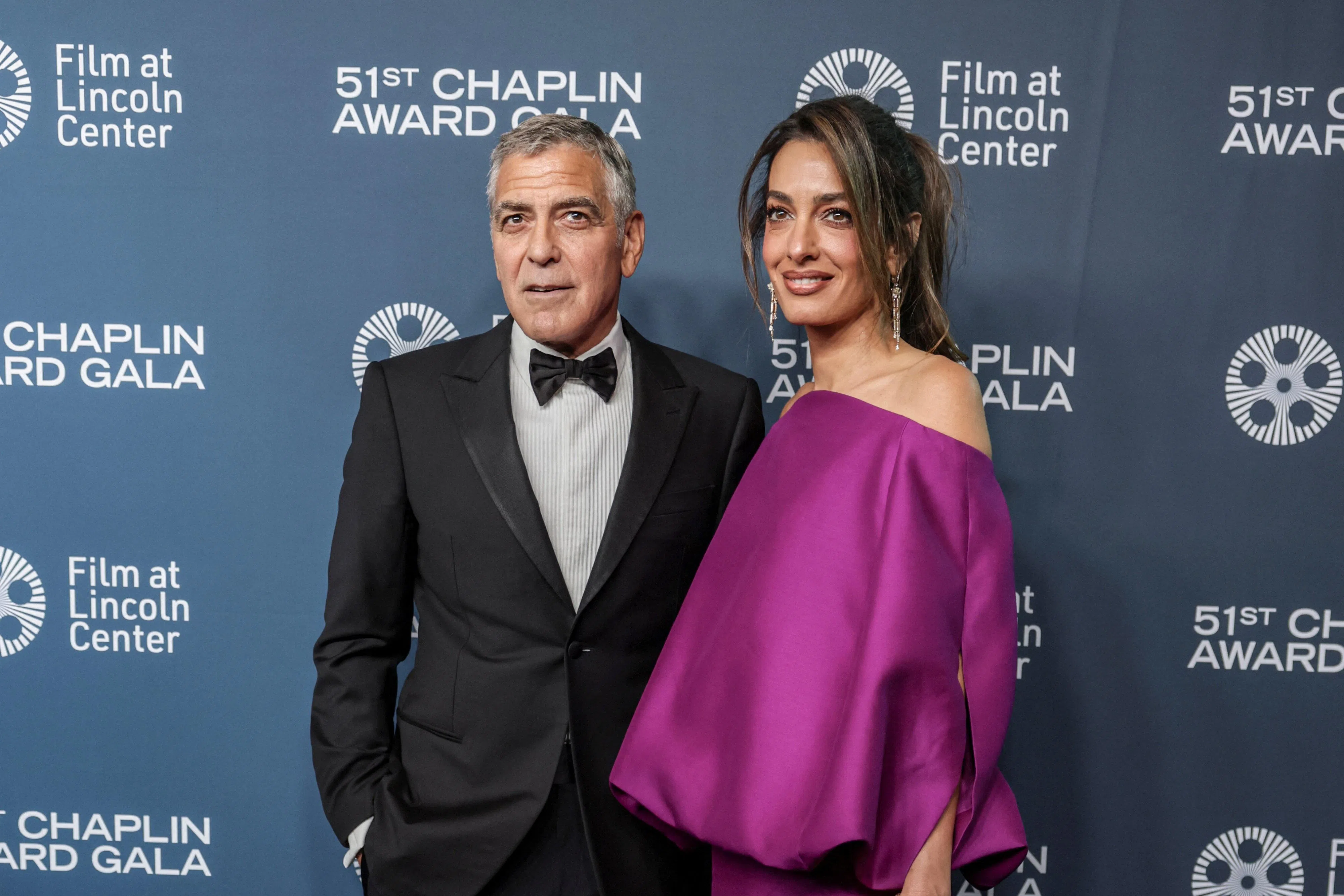 George Clooney（乔治克鲁尼，左）是本届金狮奖终身成就奖得主之一。右为其妻子Amal Alamuddin（阿莫阿拉穆丁）。（路透社）