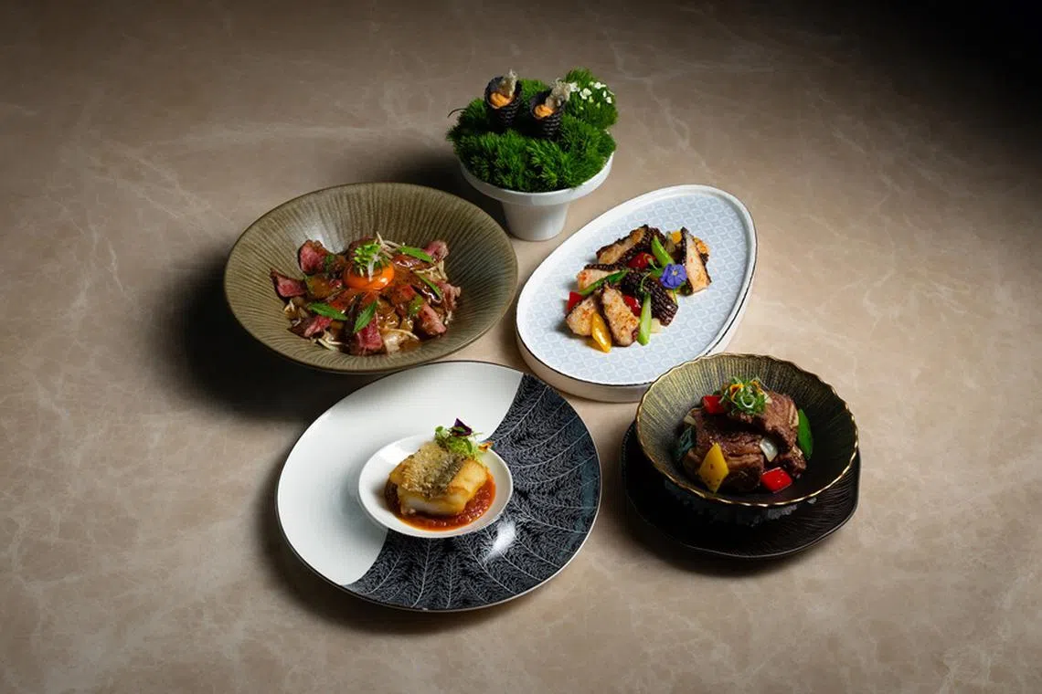 黑珍珠餐馆的菜肴中，包括主厨陈少秋参加厨艺比赛的得奖之作。（餐馆提供）