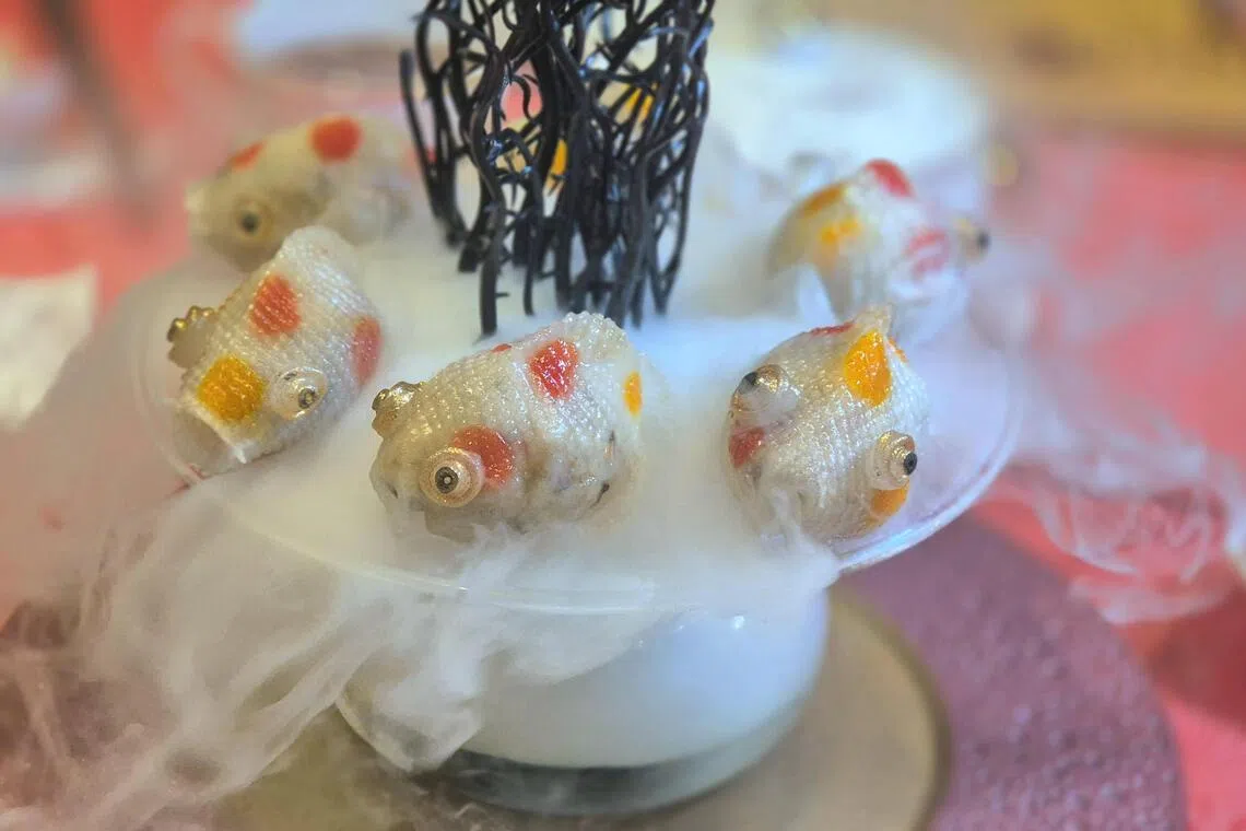 “七号公馆”剁椒金鱼饺，造型栩栩如生。（陈爱薇摄）