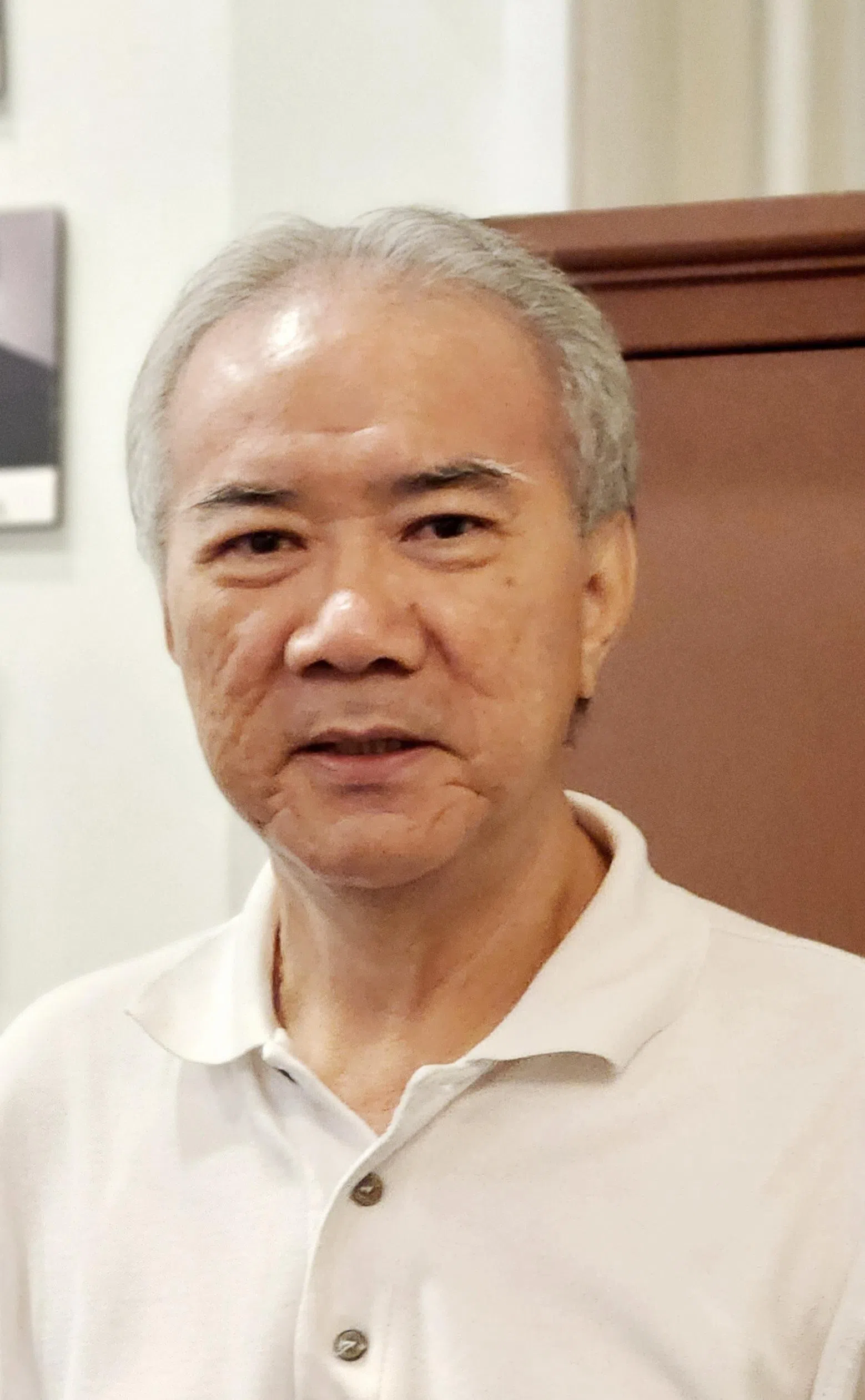 海南会馆会长潘家海呼吁琼州天后宫会员踊跃出席投票。（陈爱薇摄）