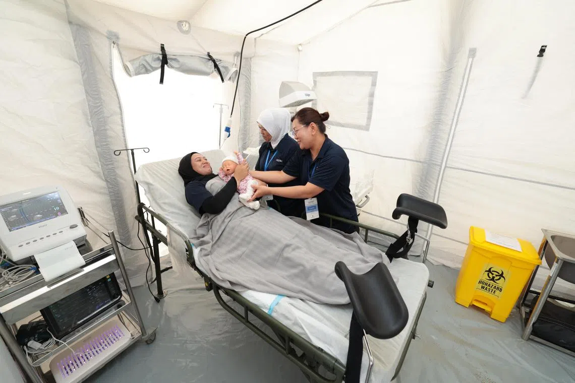 医疗区也特设妇产科和儿科服务。（梁麒麟摄）