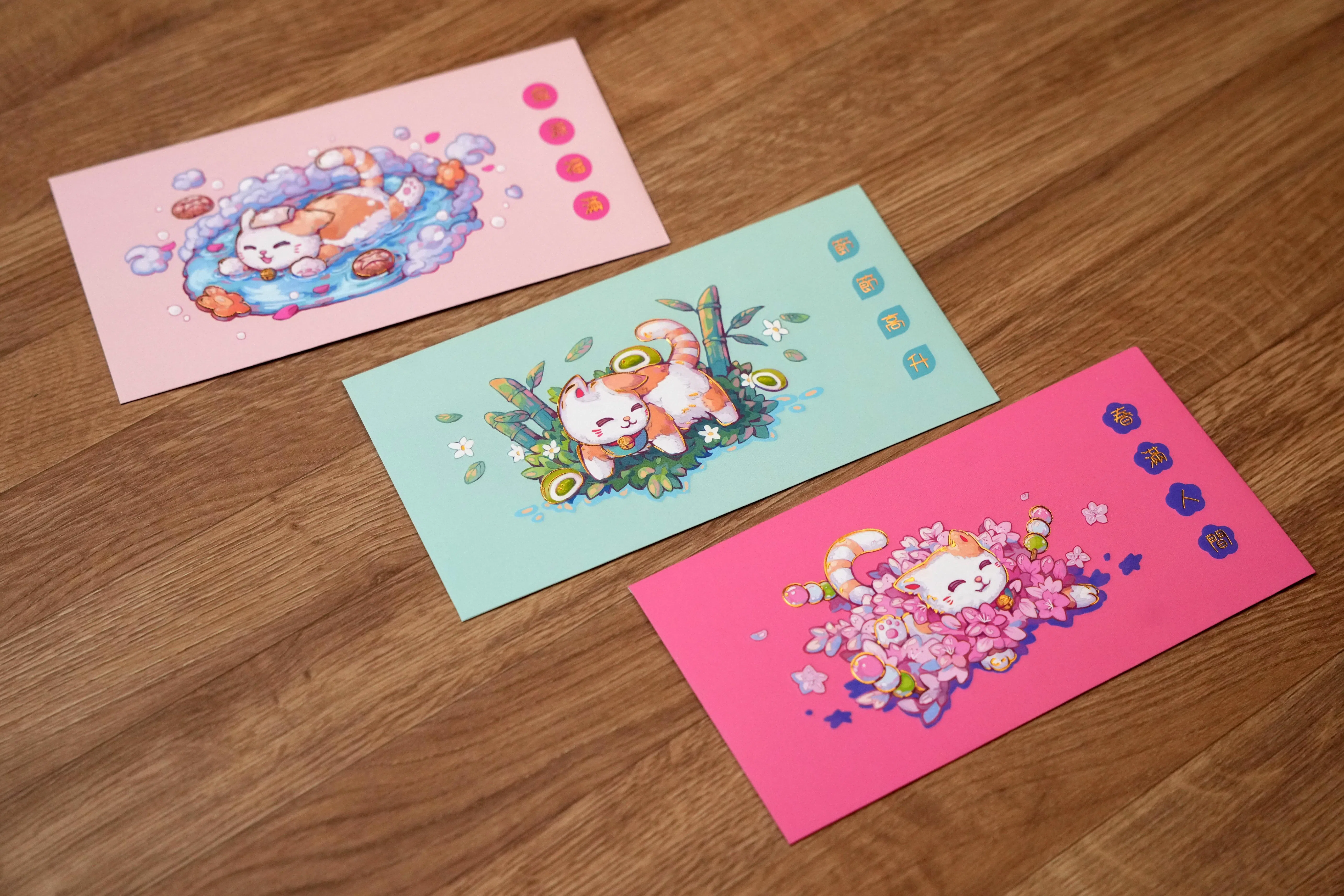 RE&S以小猫咪设计三款粉色红包。（谢智扬摄）