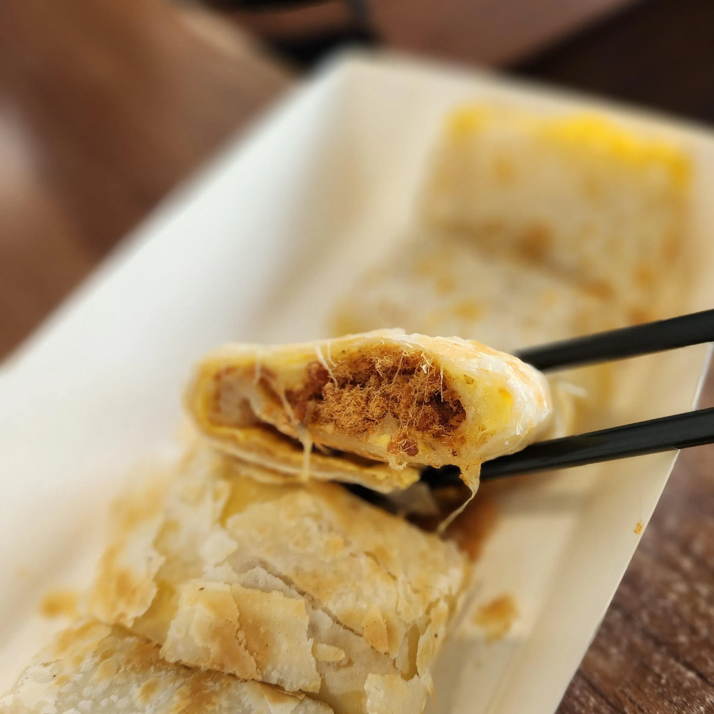 恋恋湾味的肉松起司蛋饼是台湾常见的早餐。（陈爱薇摄）