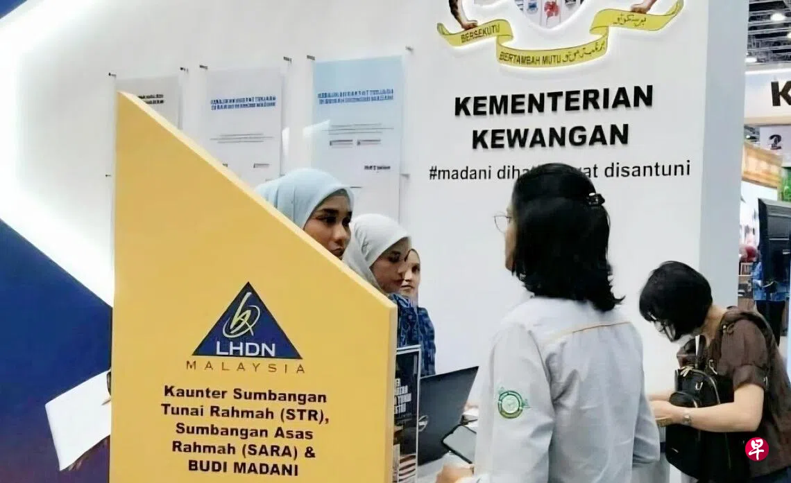 马公民每月出入新加坡八次以上不能领政府援金| 联合早报