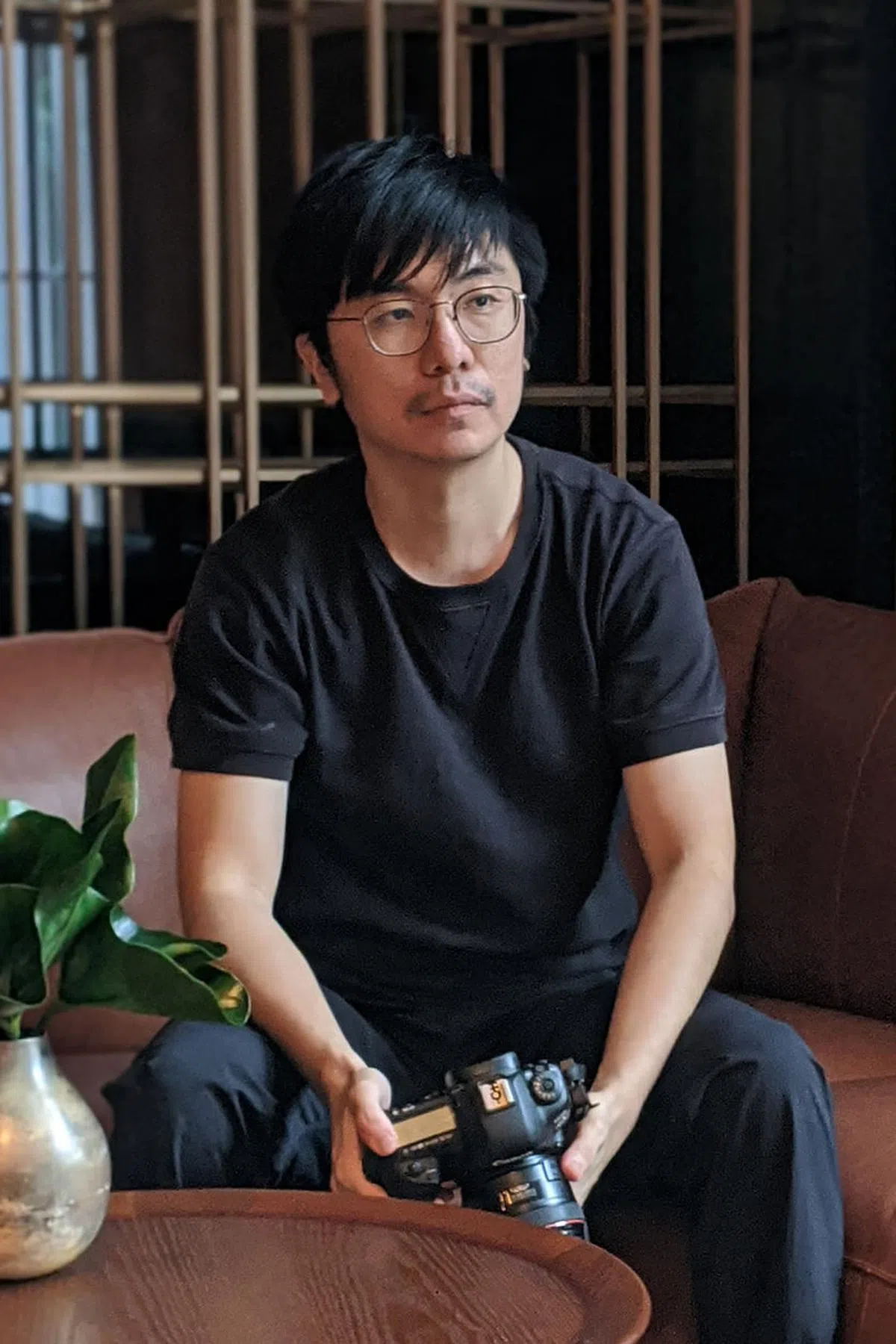 建筑师出身的王猷和，用镜头带出建筑的深层韵味。（王猷和提供）