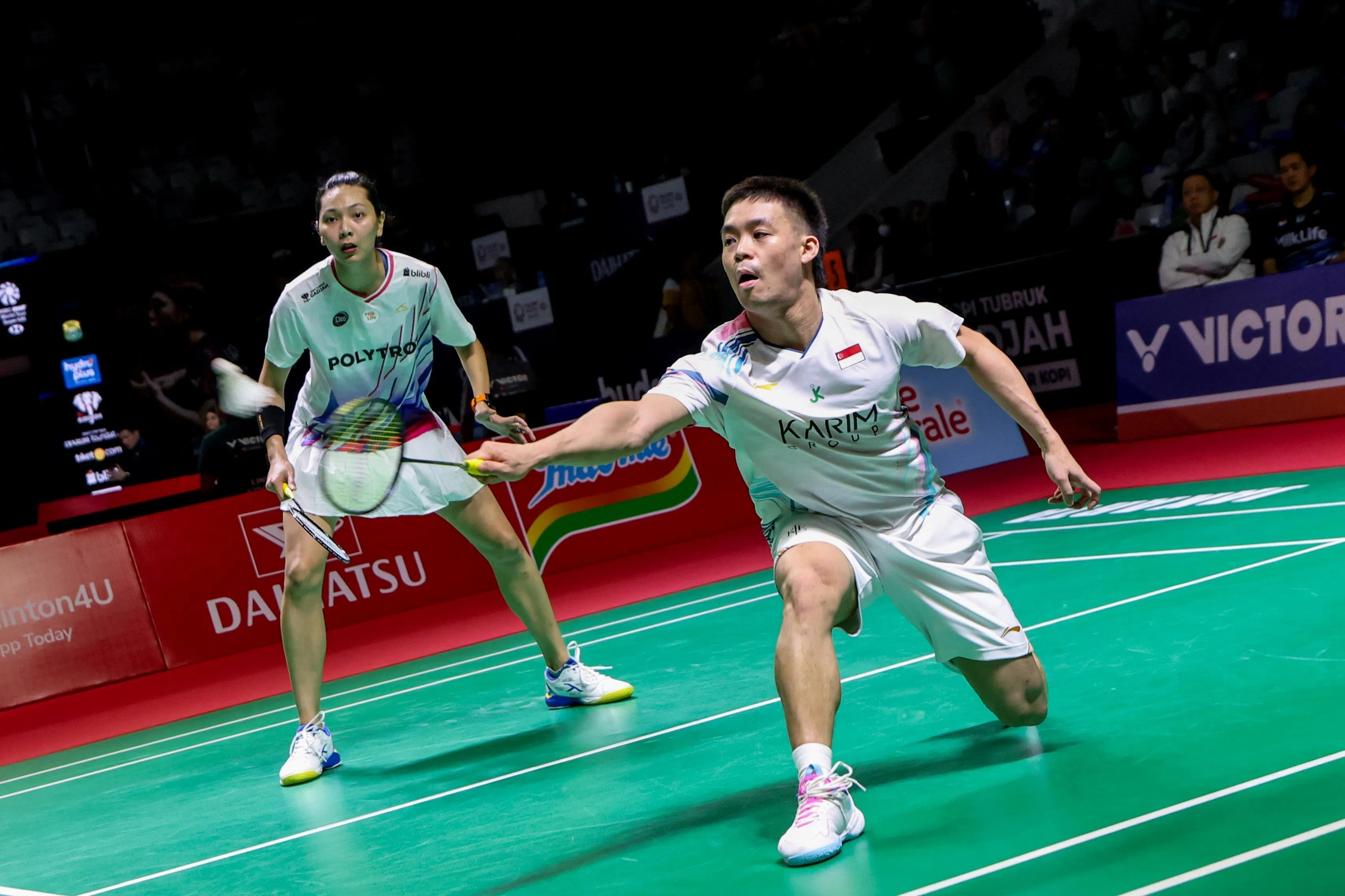 这是许永凯（右）和印尼女将格洛丽亚首次搭档参与大赛的比拼。（Badmintonphoto提供）
