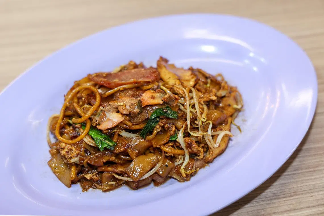 老字号来兴招牌炒粿条，配料足，面条粿条比例恰到好处。（陈斌勤摄）