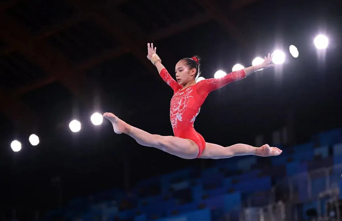 中国女子体操队选手唐茜靖上周日（25日）在一场自由操资格赛中，选用了歌曲《九儿》作为比赛的背景音乐。（互联网） 
