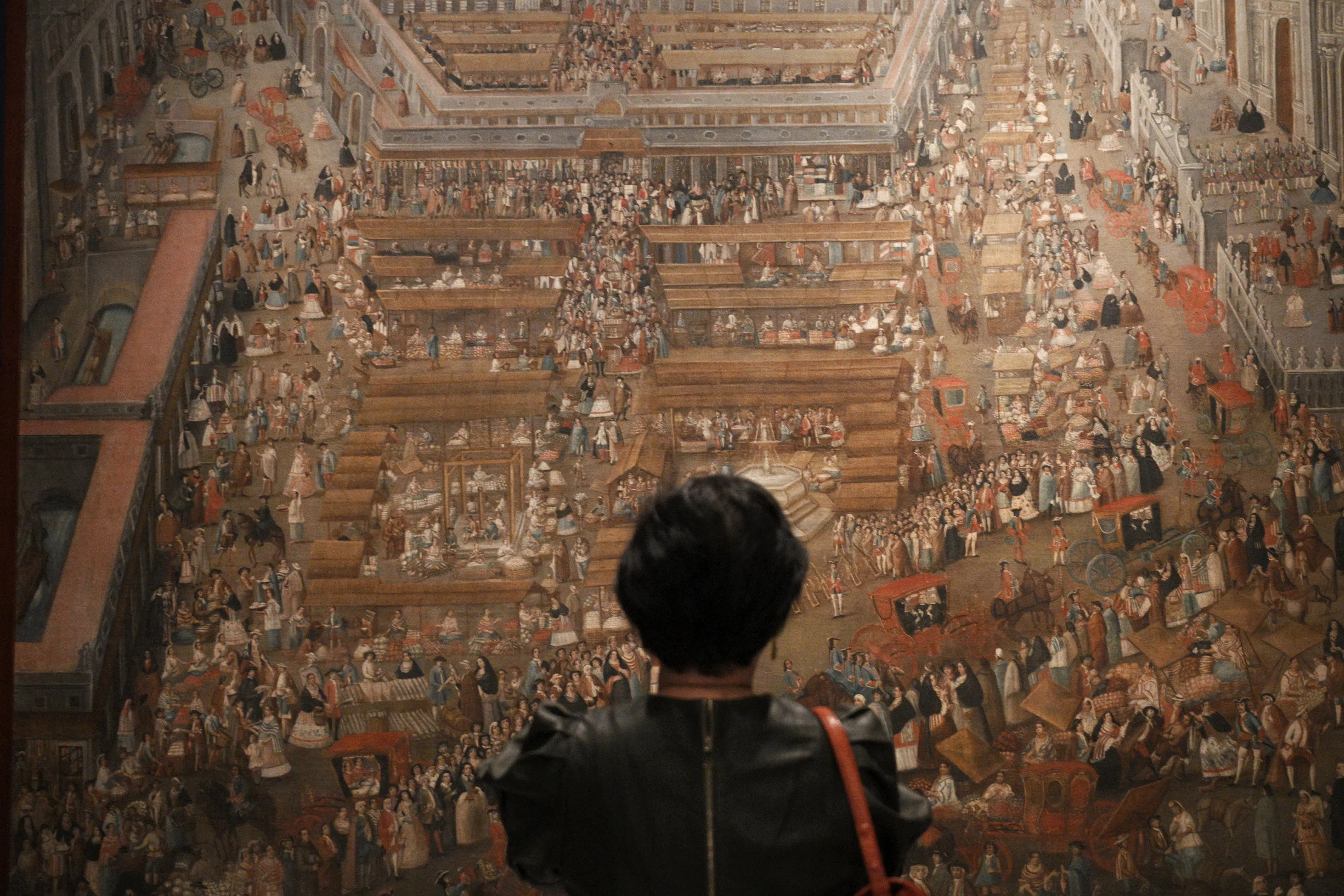 展览其中一幅油画展示了墨西哥城广场市集贸易活跃盛况。（海峡时报）