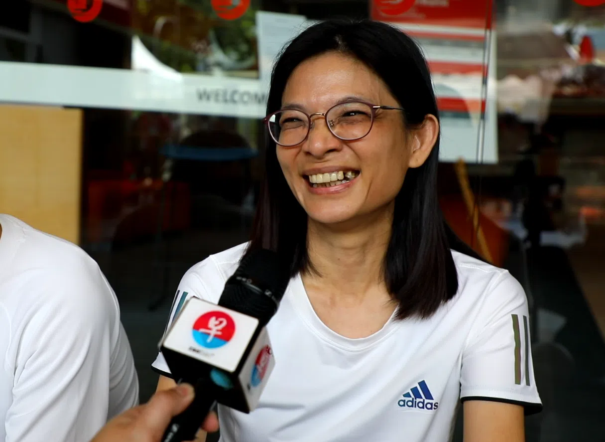 同丈夫与女儿出席早报骑行的张玲玲。