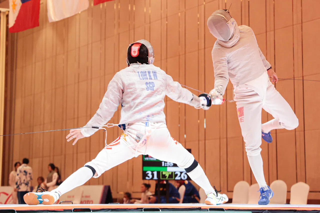 最后登场的罗凯玮顶住个人赛冠军沃拉坤，为团队拿下决赛资格。（李冠卫摄）