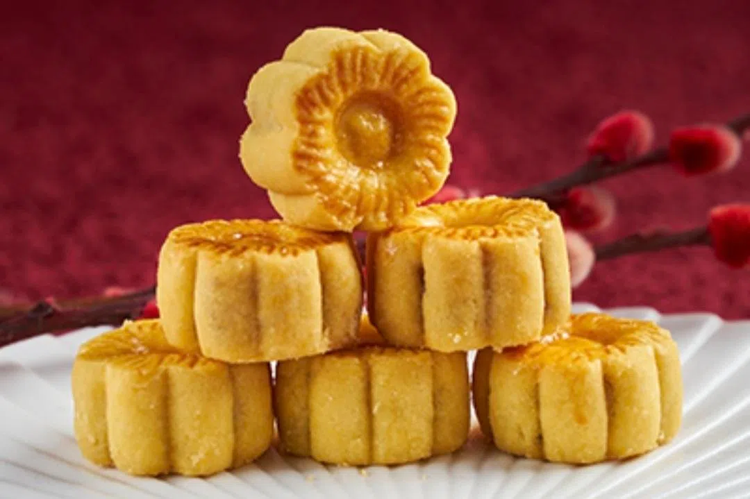 花形黄梨挞象征财富与好运，造型讨喜。（餐馆提供）