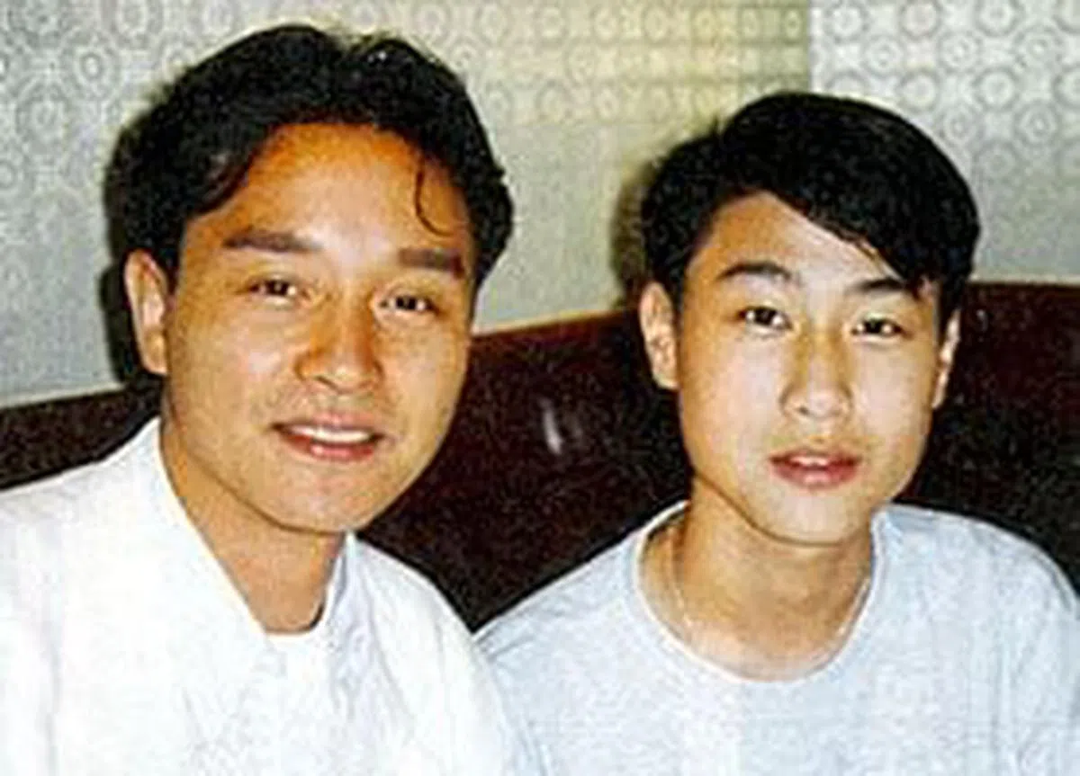 声称是“干儿子”的Justin（右）在张国荣逝世后突然现身。（互联网）