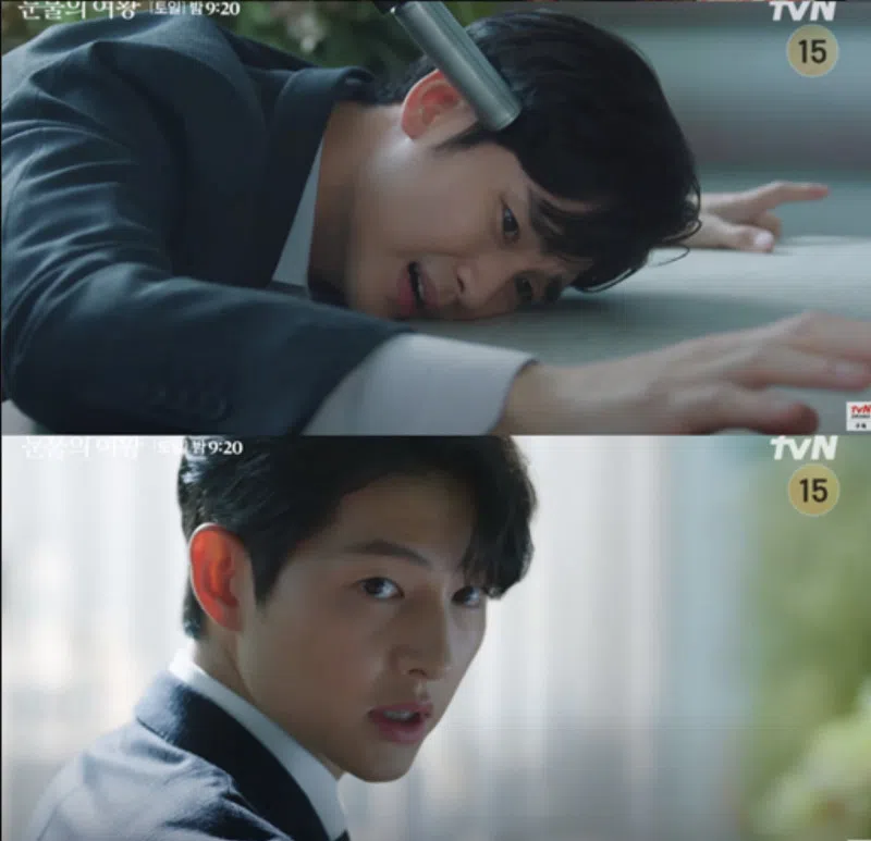 宋仲基在戏中化身“黑手党”，拿枪指着金秀贤，用武器胁迫他离婚。（互联网）