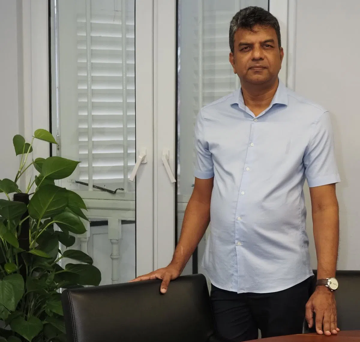 新加坡巴哈伊教主席埃兰戈说，巴哈伊教有一套完整的行政架构。（陈爱薇摄）