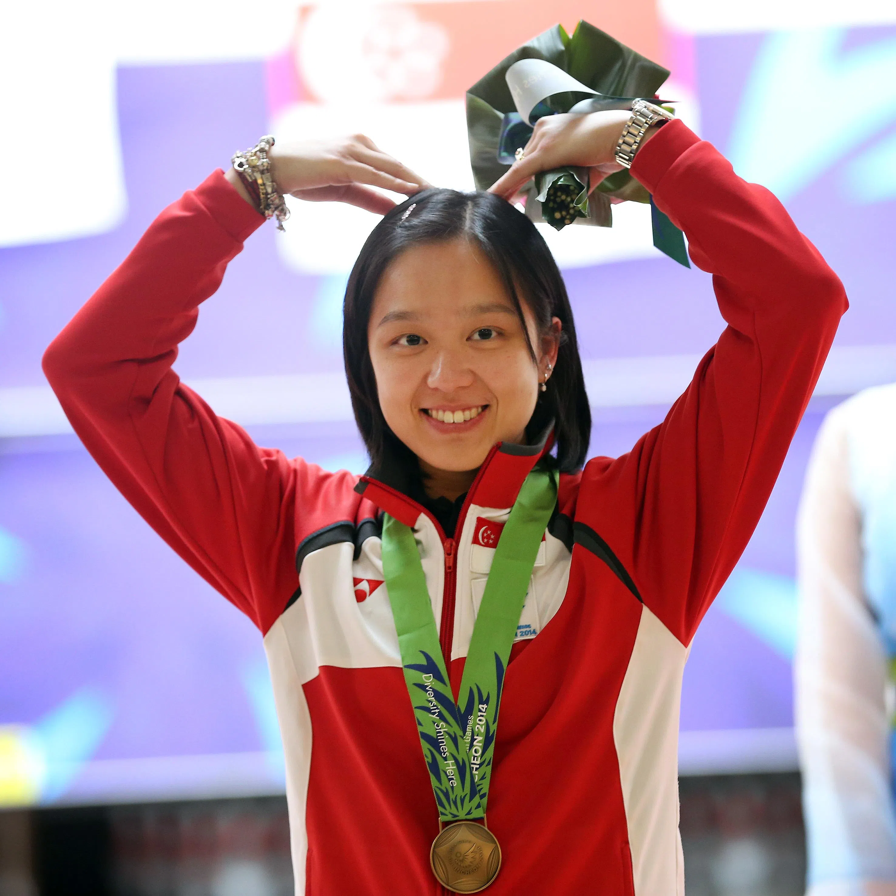 在2014年仁川亚运会上，陈诗桦以四枚奖牌成为40年来在单届亚运会获得最多枚奖牌的新加坡运动员。（档案照片）