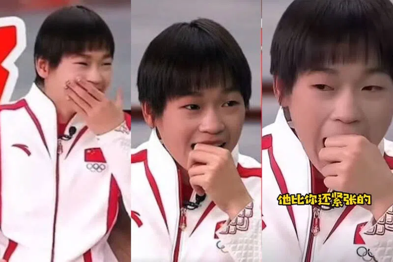 全红婵看到偶像录的视频，惊讶地张口，接着娇羞地用手捂住嘴巴。（互联网）