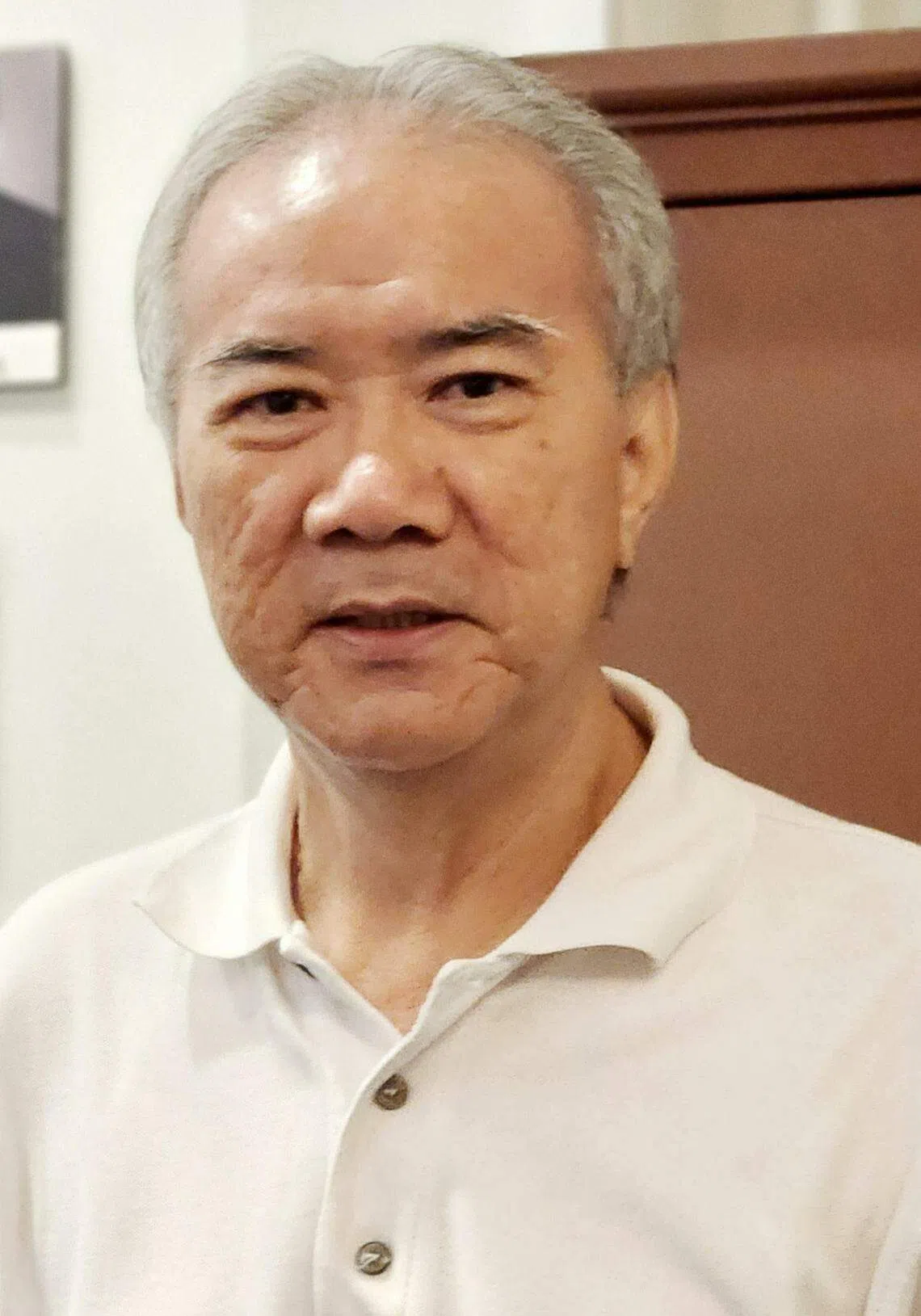 海南会馆会长潘家海呼吁琼州天后宫会员踊跃出席投票。（陈爱薇摄）