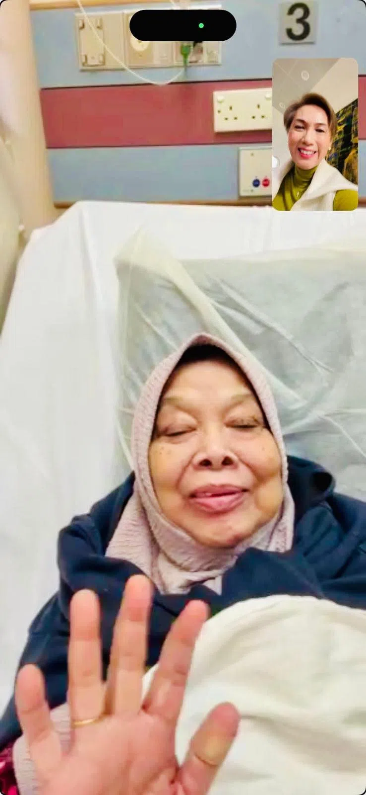 负责区内事务的议员、数码发展及新闻部长杨莉明（右上角小图）在火患发生后，已联系上住在受影响单位楼上的苏菲雅（挥手者）。（取自杨莉明脸书）