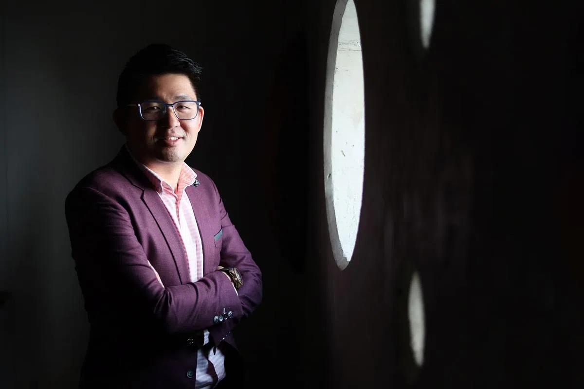 张服装私人有限公司以生产婴儿服著称，现任总裁张伟雄是公司第二代掌门人。（龙国雄摄）