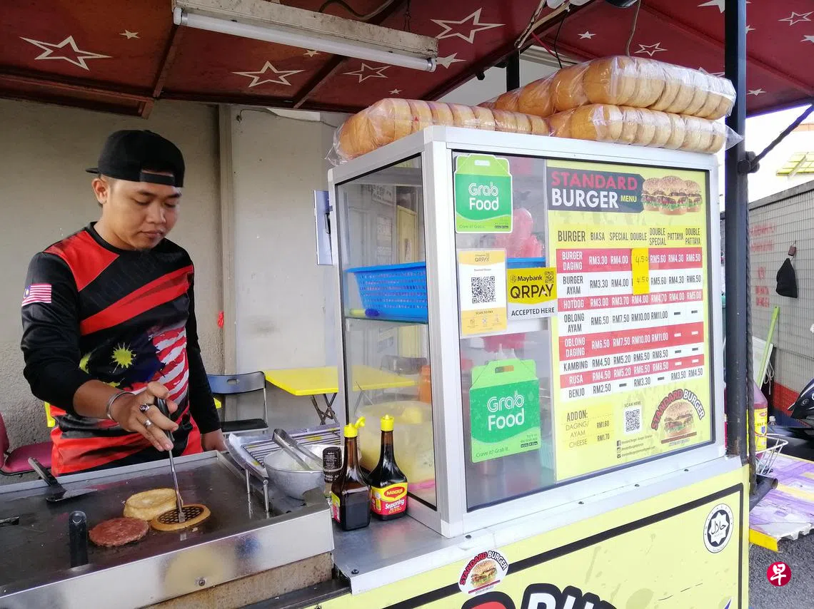 亚细安游客现可注册马国一触即通电子钱包| 联合早报