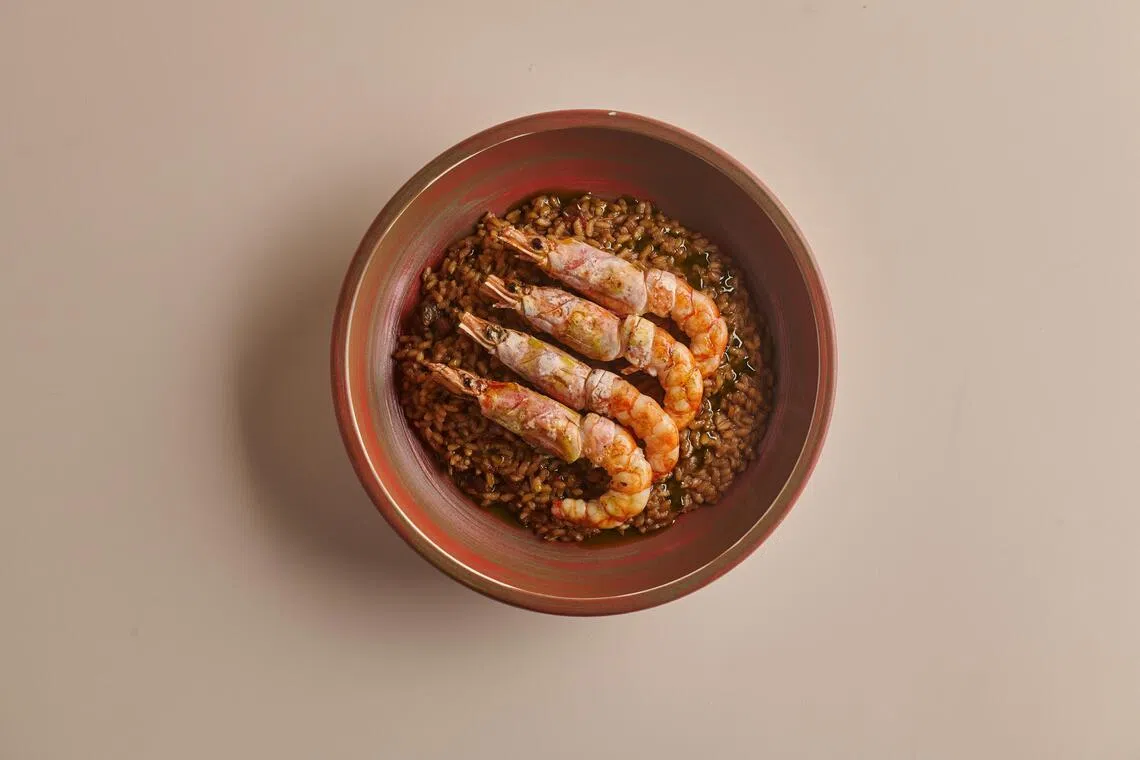 招牌阿根廷虾饭，富有海鲜的鲜甜味。（餐馆提供）