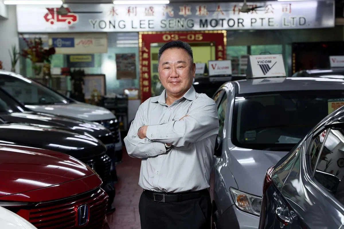 陈侠发认为数码化导致二手车商利润大减。（龙国雄摄）