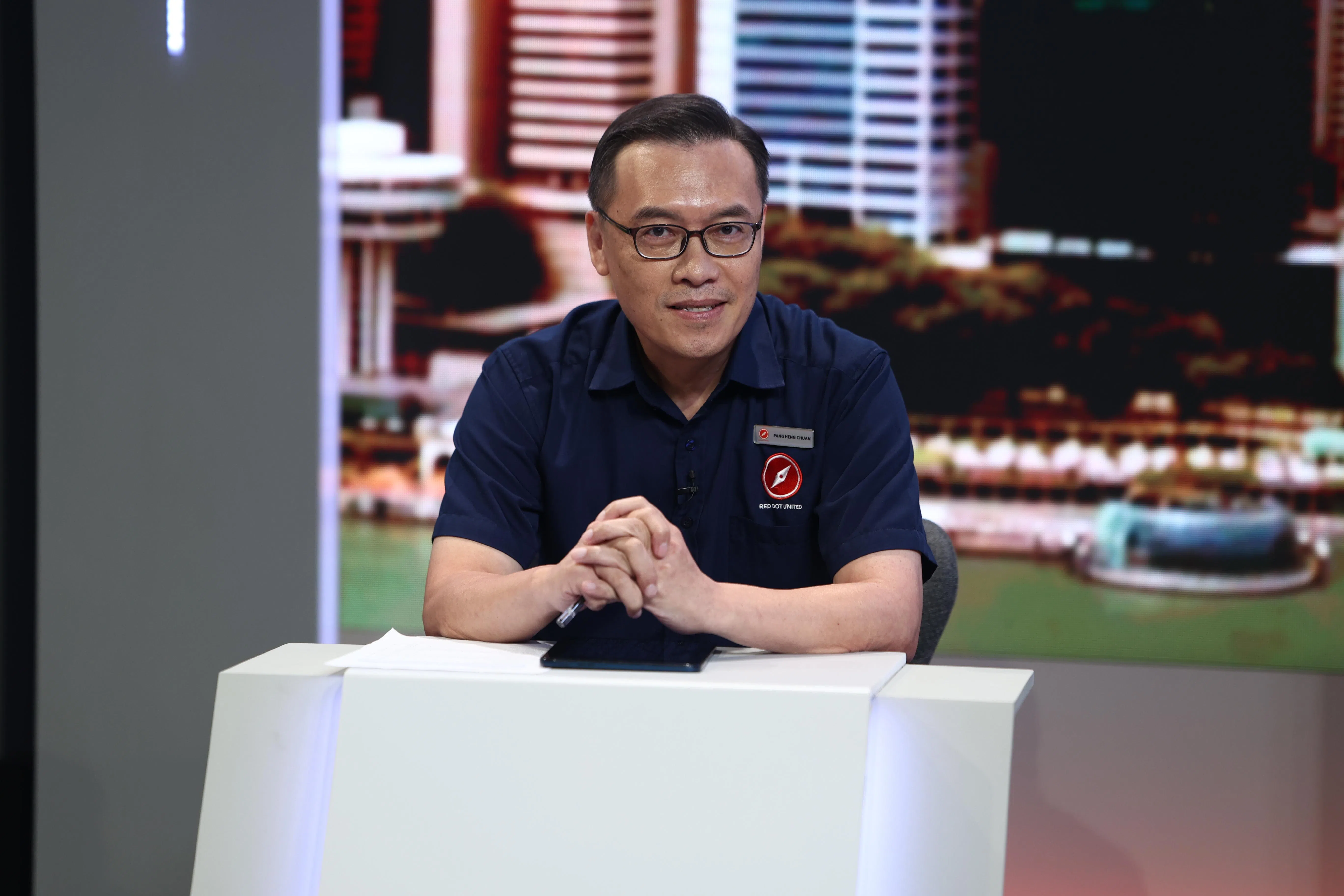 红点同心党义顺集选区候选人冯行全。（白艳琳摄）