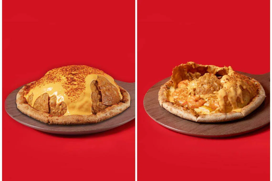 香辣汉拏芝士火山比萨的穹顶淋上玉米片芝士酱，将墨西哥玉米片打碎，可搭配韩式辣味虾享用。（餐馆提供）