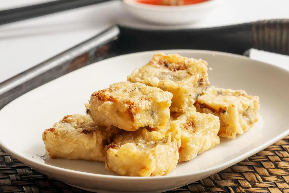 鼎泰丰的酥炸豆腐，加了莲藕、香菇、胡萝卜和黑木耳增添口感。（餐馆提供）