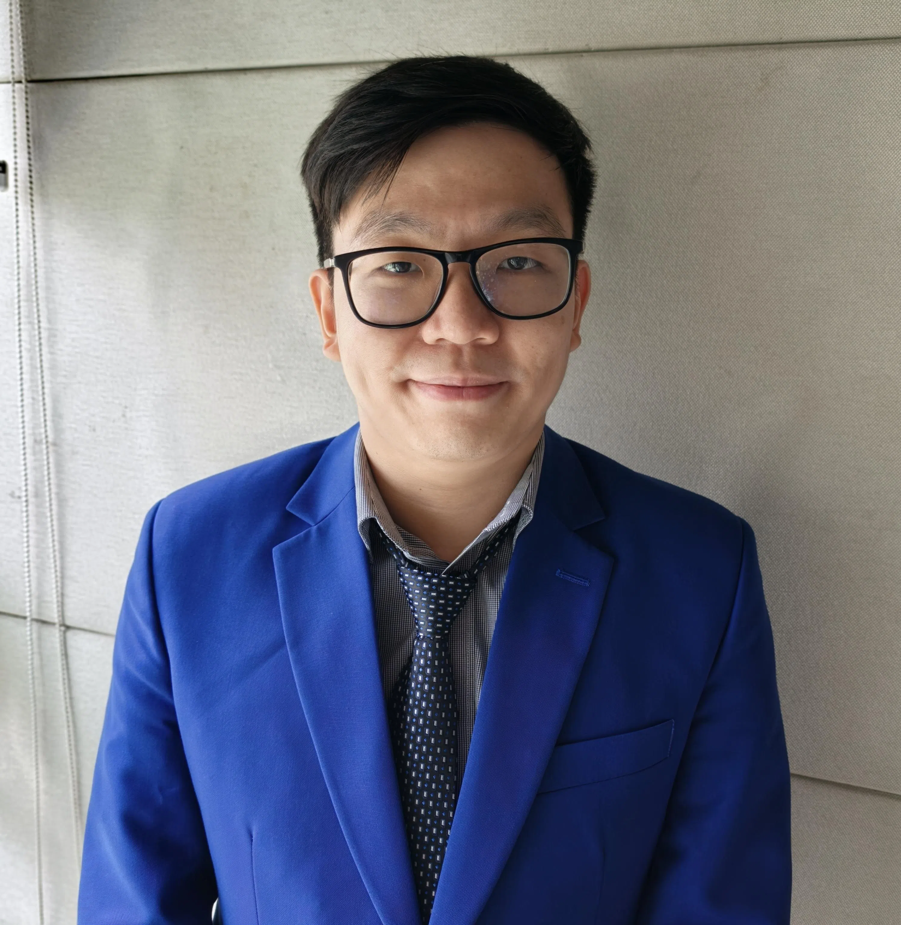 电脑系统架构师张汉丰说，OpenClaw可以帮助他自动处理一些繁琐工作。（黄少伟摄）