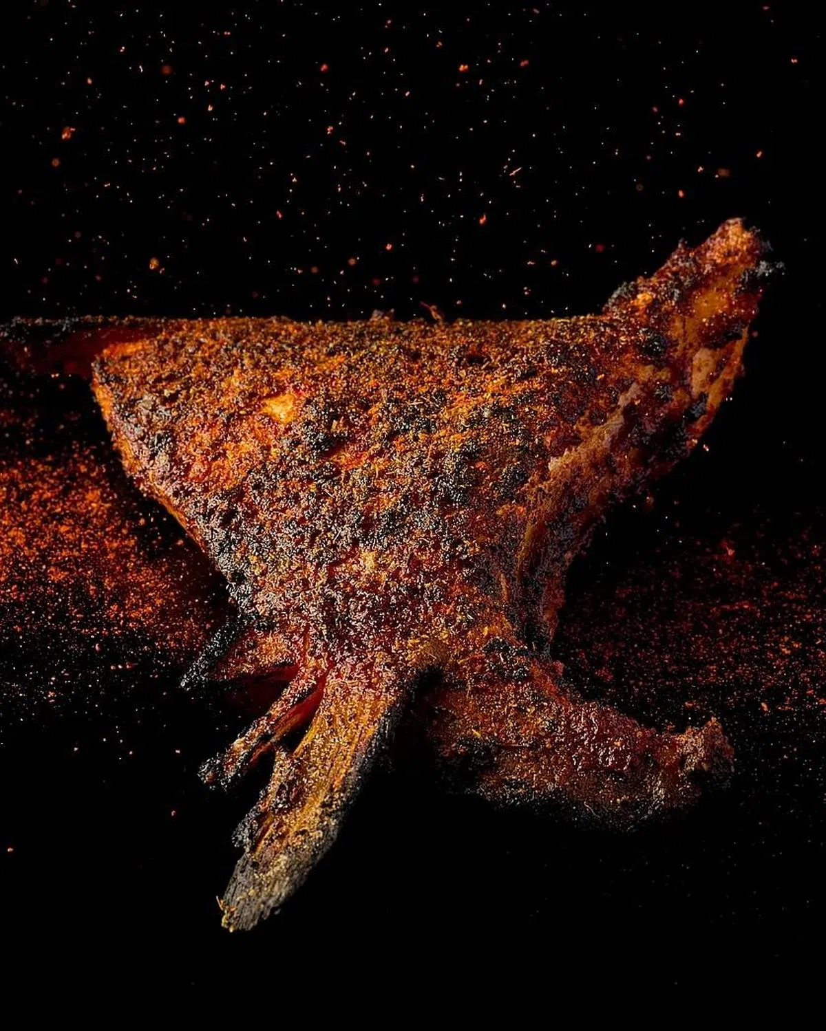 Revolver餐馆带印度风味的烤油甘鱼。（餐馆提供照片）