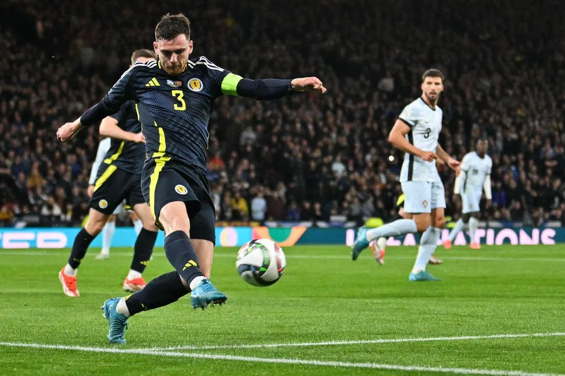 罗伯逊的进球虽然为苏格兰取得了胜利，球队仍无缘复赛。（法新社）