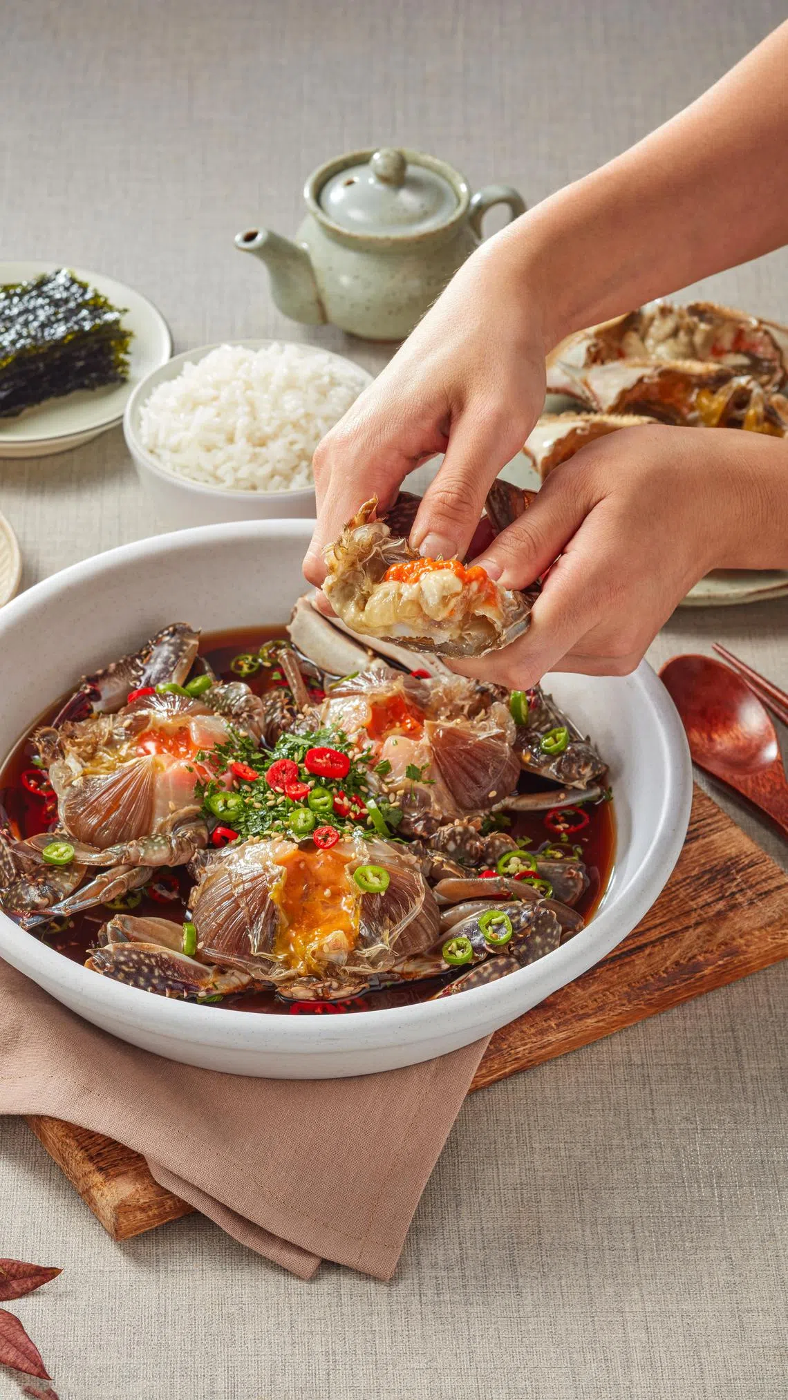 Hansik Dining Collective的酱油生螃蟹鲜甜下饭。（餐馆提供）