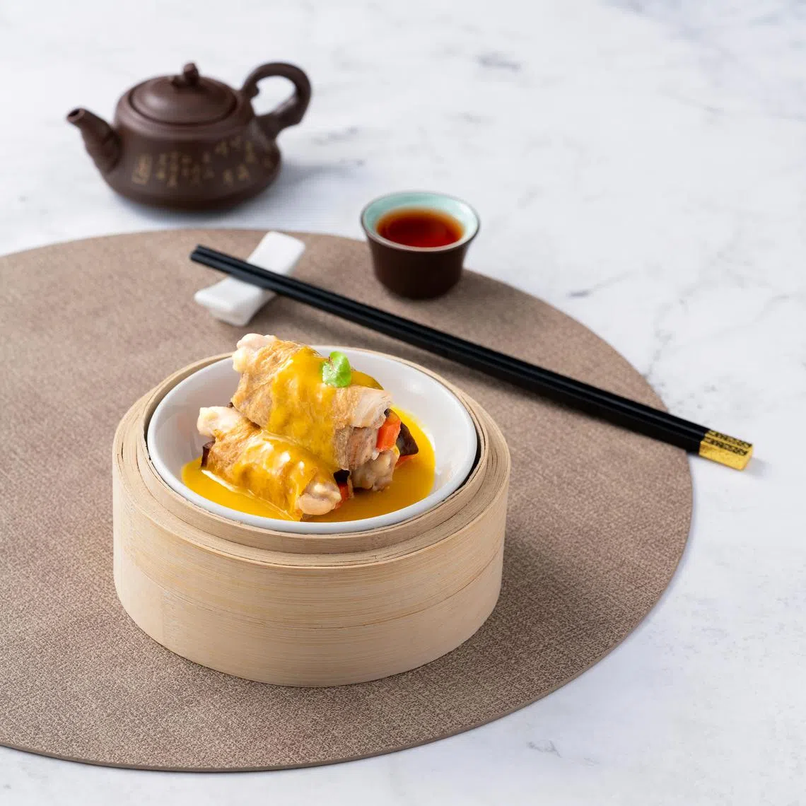 嘉味中餐馆的四宝扎内有芋头、香菇、红萝卜和鸡肉。（餐馆提供）