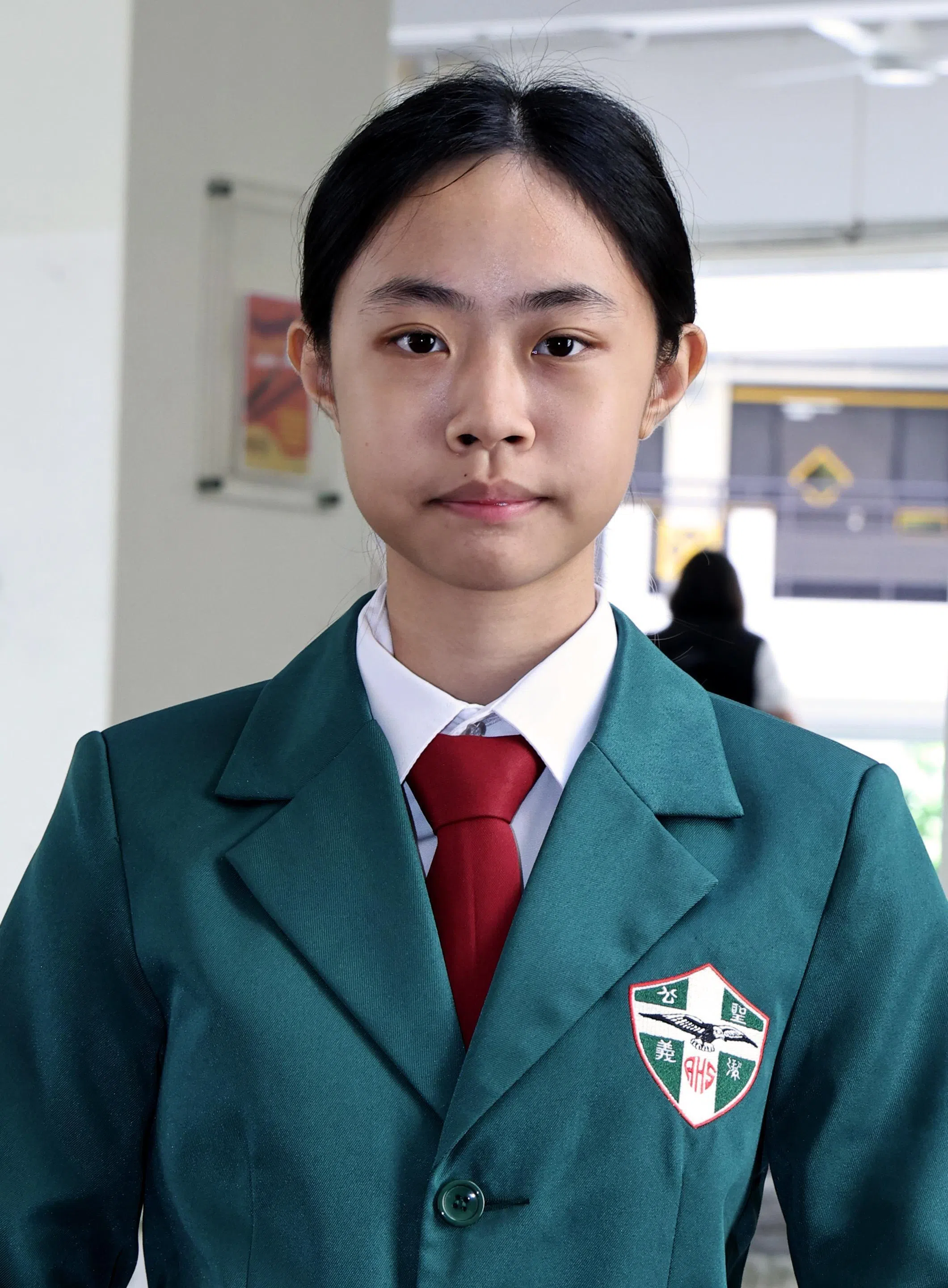 圣公会中学中四学生黄馨恩（16岁）是今年华文语文特选课程飞跃奖得主之一。（周国威摄）