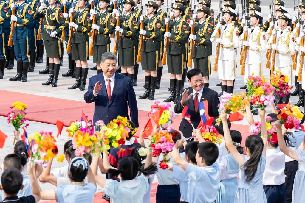 习近平：推动中老经济走廊合作提质升级