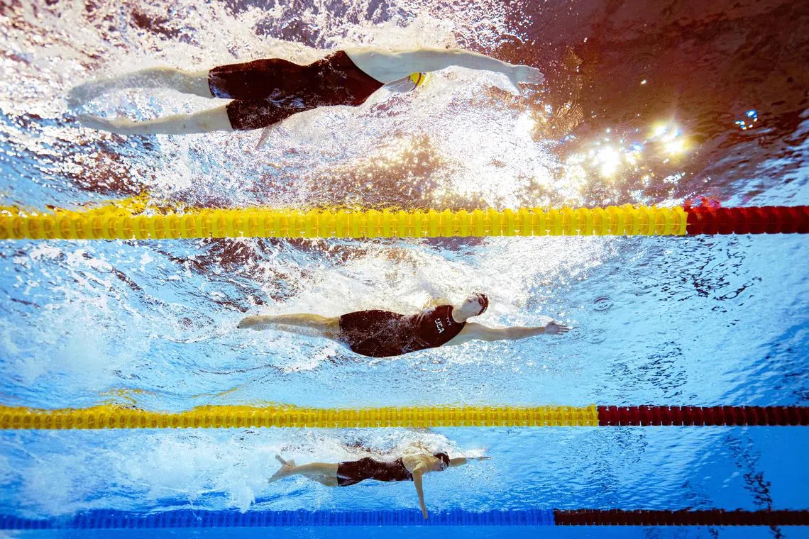 拉妮（上）、凯蒂（中）和萨默（下）在比赛中几乎齐头并进。（法新社）