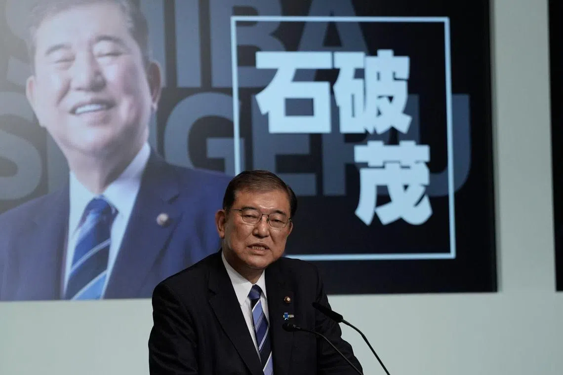 石破茂承诺“终结民众对自民党的普遍不信任”。（彭博社）