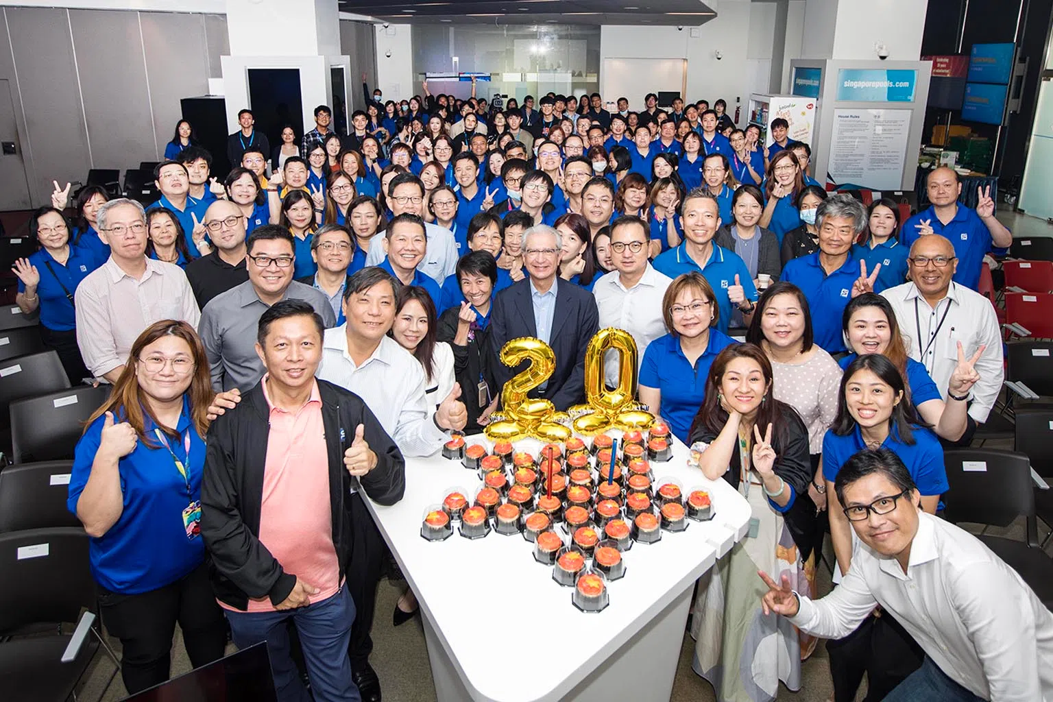 职员义工计划今年庆祝20周年。在庆祝会上也颁奖给职员义工得奖者。（图/新加坡博彩公司提供）