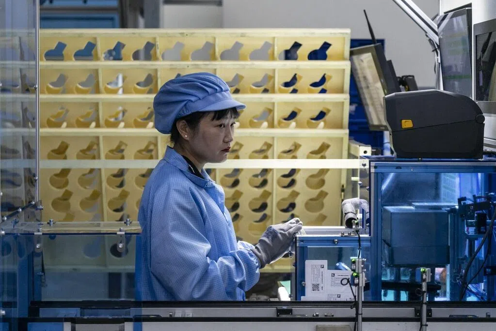AI热潮带动出口 中国6月制造业PMI重返扩张区间